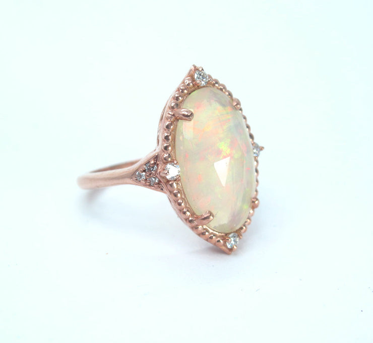 5 carat Welo Opal and diamond 14k rose gold ring