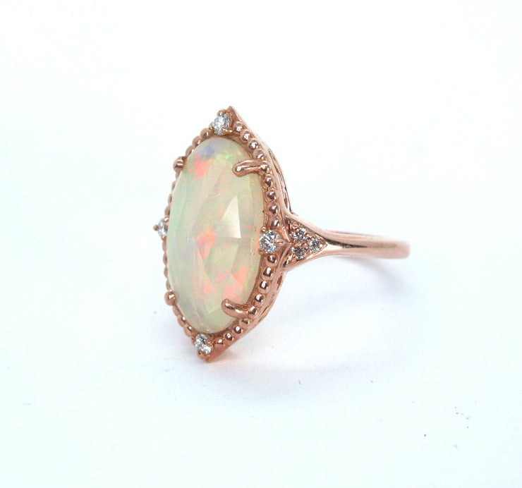 5 carat Welo Opal and diamond 14k rose gold ring