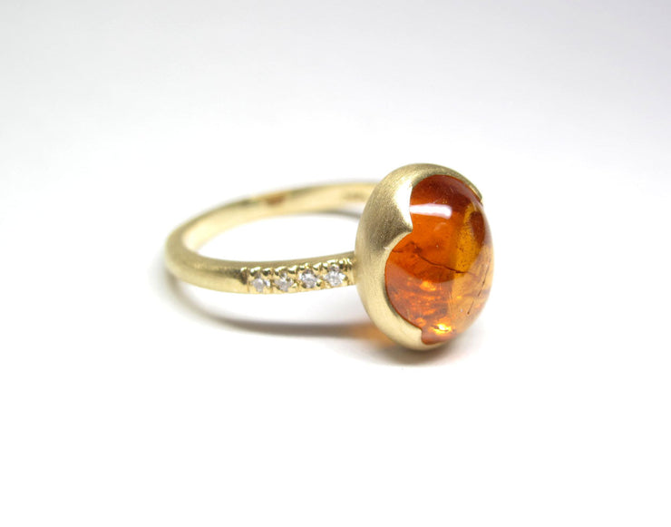 Manderine Garnet and diamond 18ky gold signature ring